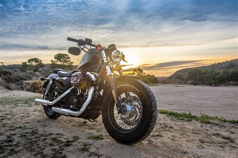 Cruiser Motorcycle On Dirt Road · Free Stock Photo