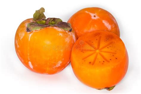 Whole And Cut Across Oriental Persimmons On White Background Closeup