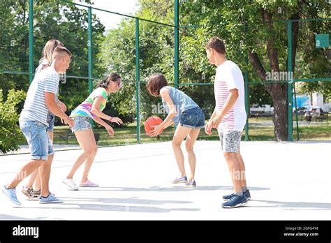 Teenagers Playing Basketball Stock Photo Alamy