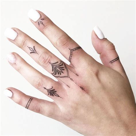 37 small delicate tattoos for women in 2020 hand tattoos for women tiny finger tattoos small
