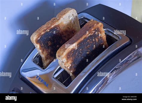 Burnt Toast In Toaster Burned Stock Photo Alamy