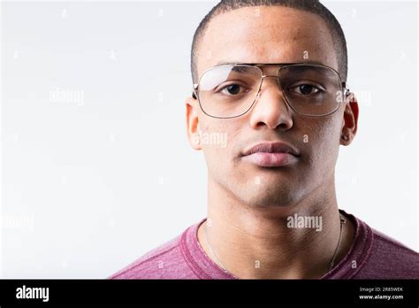 Portrait Of A Serious Expressionless Young Black Man Wearing Metallic
