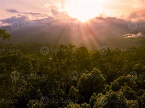 Sunrise Over Forest With Sunburst And Mountain 8440088 Stock Photo At