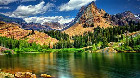 Landscape View Of Rock Mountains And River Surrounded By Green Trees Hd