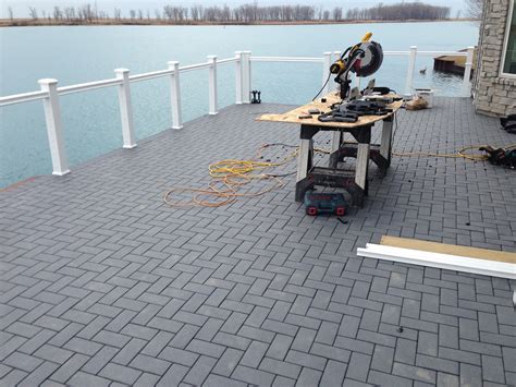 Outdoor Living Low Sloped Roof Decks Composite Pavers And Cable Rail