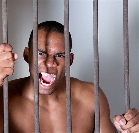 Black Man Behind Bars Stock Photos Pictures And Royalty Free Images Istock