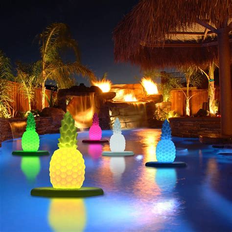 These Floating Pineapple Lights Are The Cutest Way To Light Up Your Pool Pineapple Lights