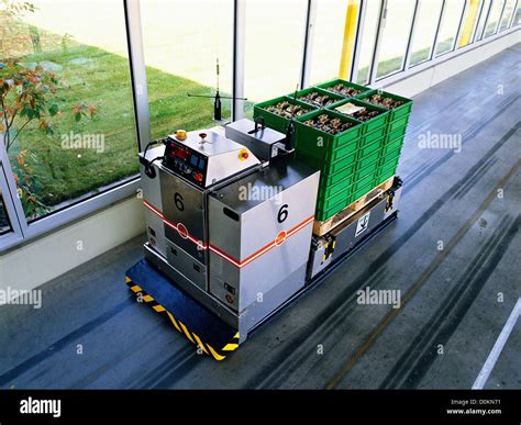 Automatic Guided Vehicles Agv Are Factory Robots Carrying Materials