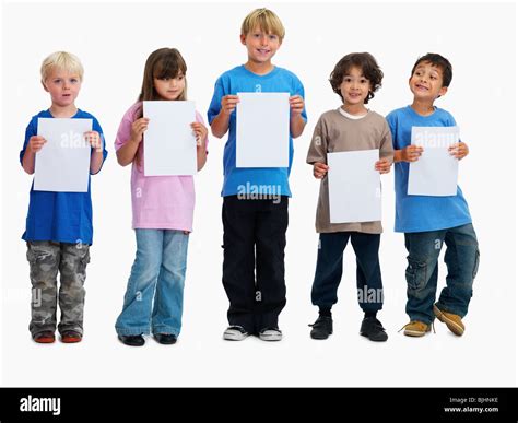 Children Holding Paper Stock Photo Alamy