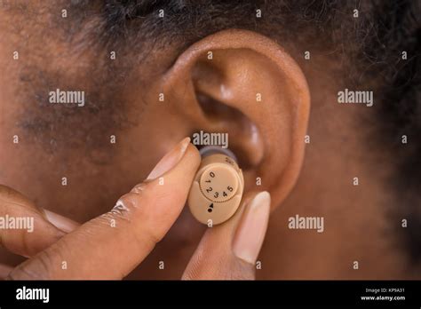 Hearing Aid Ear Black Hi Res Stock Photography And Images Alamy