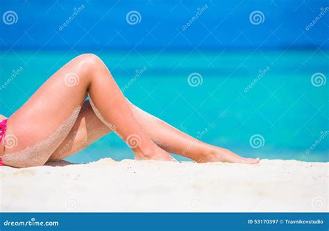 Female Slim Tanned Legs On A White Tropical Beach Stock Image Image