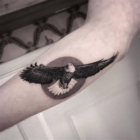 Black And Grey Eagle Tattoo On The Left Forearm Eagle Tattoo Eagle