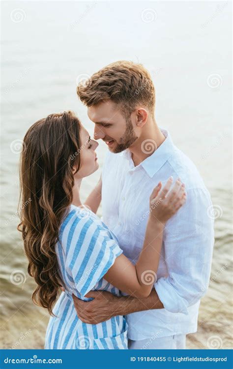 Handsome Man Hugging Beautiful Girlfriend Near Stock Image Image Of Pond Natural