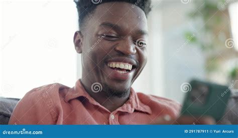 Happy Laugh And Black Man On Sofa With Phone For Social Media Meme Internet Joke And Funny