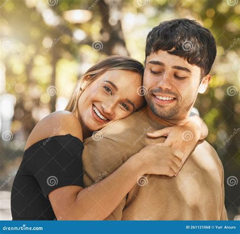 love couple and hug being happy smile and romantic for relationship bonding and outdoor