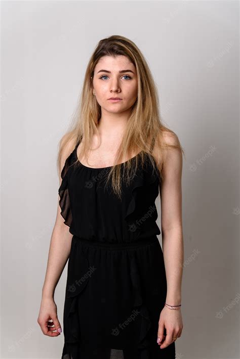 Premium Photo Beautiful Blonde Girl In A Black Dress