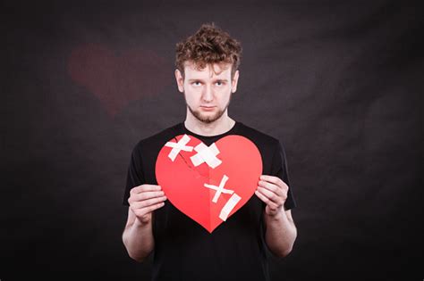 Sad Man With Glued Heart By Plaster Stock Photo Download Image Now