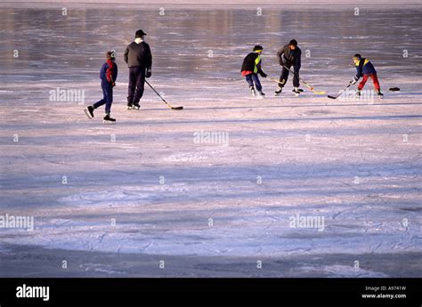 Playing Ice Hockey On A Frozen Canadian Lake Stock Photo Alamy