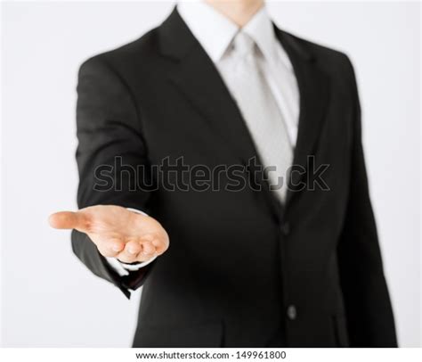 Close Mans Hand Showing Something Stock Photo 149961800 Shutterstock