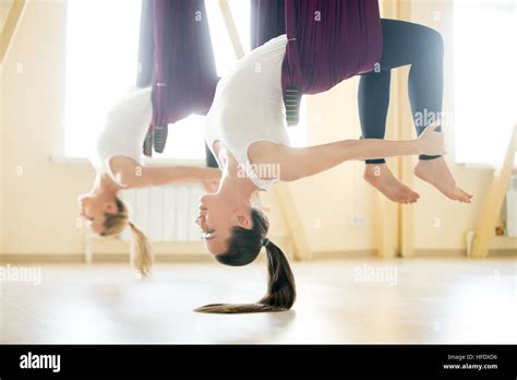 Bow Yoga Pose In Hammock Stock Photo Alamy