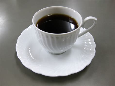 Filewhite Cup Filled With Coffee