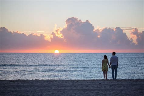 Couple Engagement Photos Watching The Sunrise In Miami Beach © Couples
