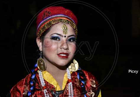 Image Of Assamese Woman In Traditional Assam Tribal Clothes During Bihu Festival Celebrations In