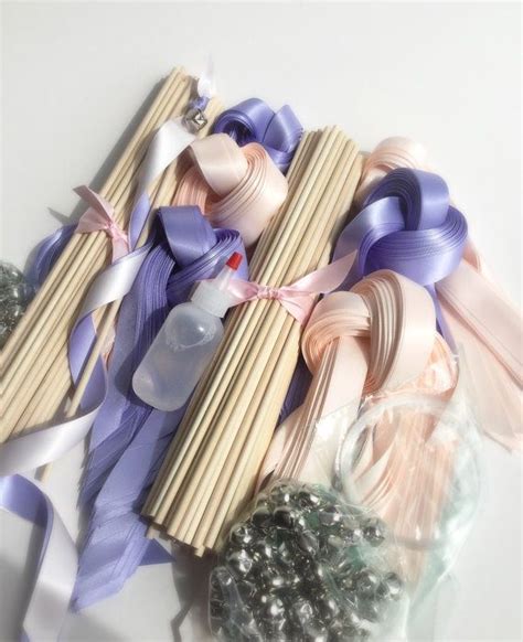150 diy wedding wand kit your choice of ribbon color thebridesmadeshop 5 out of 5 stars (3,387) $ 75.00 free shipping add to favorites 50pcs handmade wedding wands with triple ribbon and bell, wand streamers,ribbon sticks,magic fairy wands,bridal shower photo prop cheonusweddingstudio 5 out of 5 stars (139. 200 DIY Wedding wand kit your choice of ribbon color | Diy wedding wands, Diy wedding, Wedding wands