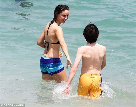 Calista Flockhart Shows Off Her Bikini Body As She Braves The Waves On