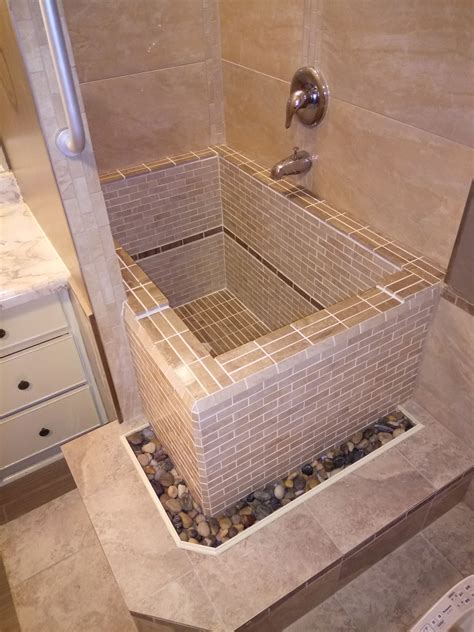 Cleaning a bathtub is a must because like other, it does sustains dirt over time. Roman style concrete deep soaking tub with tiles ...