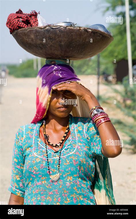 Beautiful Color Woman Native Hindu Portrait With Food On Head Outside