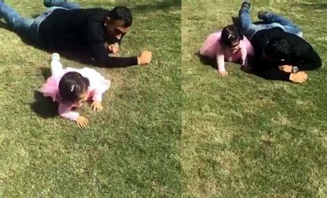 indian cricketer ms dhoni crawling with daughter ziva dhoni on grass video goes viral नन्ही