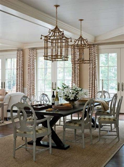 This dining room pairs chinoiserie chairs and a woven pendant light with a modern color palette of whites, grays, and greens. The Chinoiserie Dining Room | House and home magazine, Home