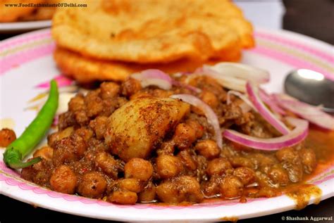 Chole bhature as we all know is the most popular indian street food in the capital city of new delhi. Safe and Tasty Winter!! | Crave Bits