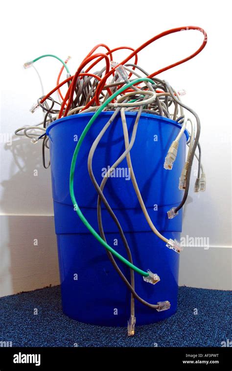 Pile Of Internet Cables In Rubbish Bin Stock Photo Alamy