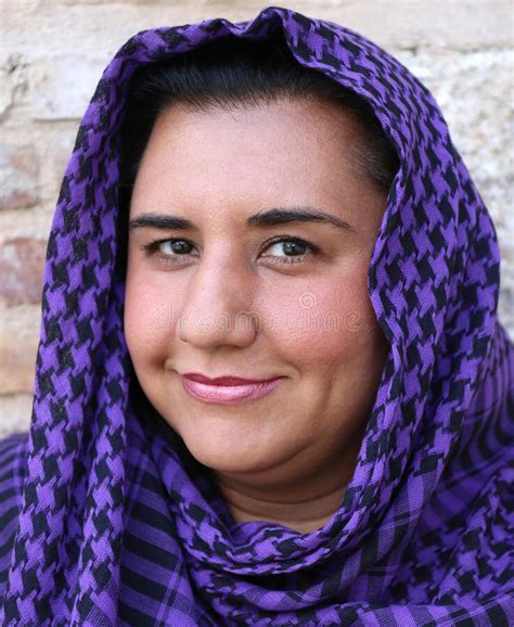 Pretty Middle Eastern Woman With Islamic Scarf Purple And Black