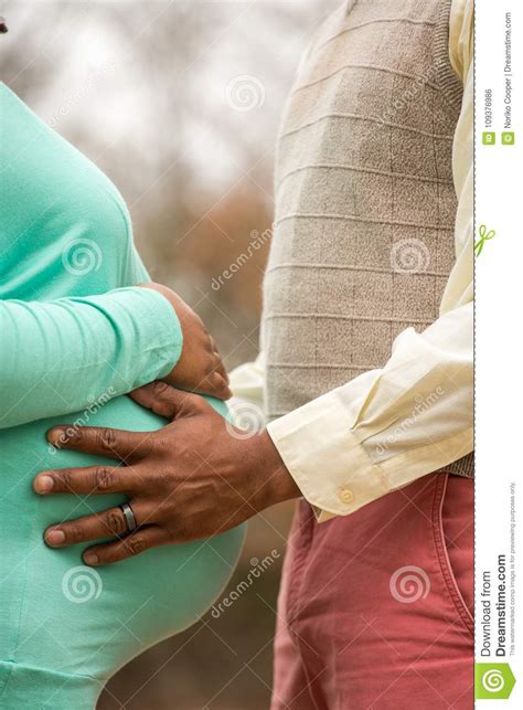 Portrait Of A Happy Pregnant African American Couple