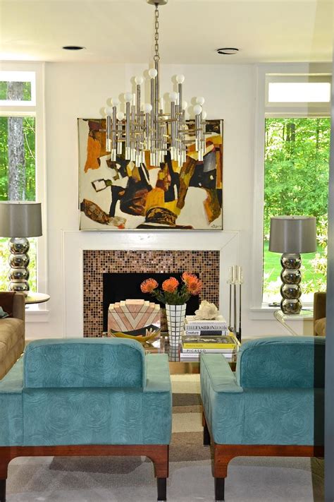Chandeliers are best suited for voluminous areas and rooms meant for congregating and those that can be seen from a distance, such as a porch or a more formal space like a dining room or living room. Living Room Features Midcentury Modern Furnishings ...