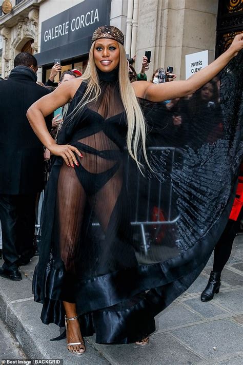 Laverne Cox Shows Off The Flesh In A Cutout Bodysuit Under A See Through Dress At Gaultiers Pfw