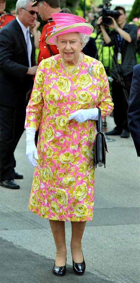 10 Of Queen Elizabeths Most Colorful Outfits Over The Years Iheart
