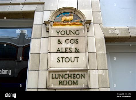 Luncheon Room And Young And Cos Ales And Stouts Signs And Image Of A