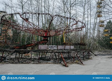 Abandoned Carousel And Abandoned Ferris At An Amusement Park In The