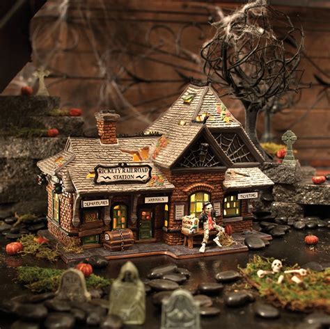 A Miniature Halloween Store With Pumpkins On The Ground And Decorations