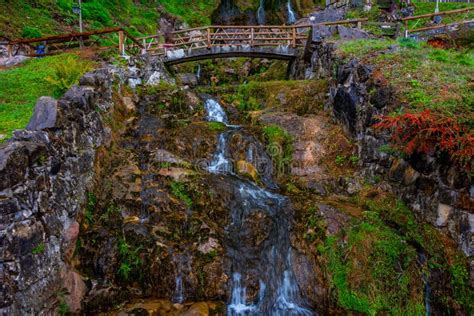 Waterfall Flowing From St Beatus Caves In Switzerland Stock Photo