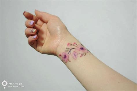 10 Beautifully Designed Floral Watercolor Tattoos