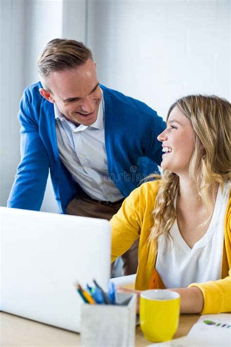 Happy Colleagues Talking In Office Stock Photo Image Of Business