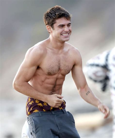 the 33 most important things zac efron s arms did in 2014 pretty much we are your friends zac