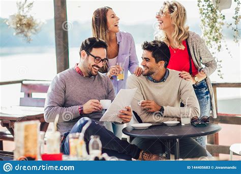 Group Of Four Friends Having Fun A Coffee Together. Stock Image - Image ...