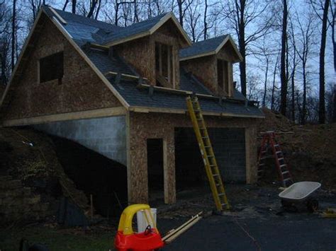 A 4 bay barn,built into the hillside,attached to the cottage next door,of which it is now a part. I give up!! Garage/Basement built into hillside in ...