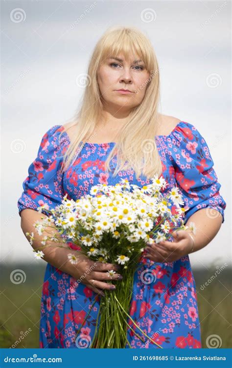 Chubby Girl In A Meadow With Flowers Stock Image Image Of Emotion Daisy 261698685